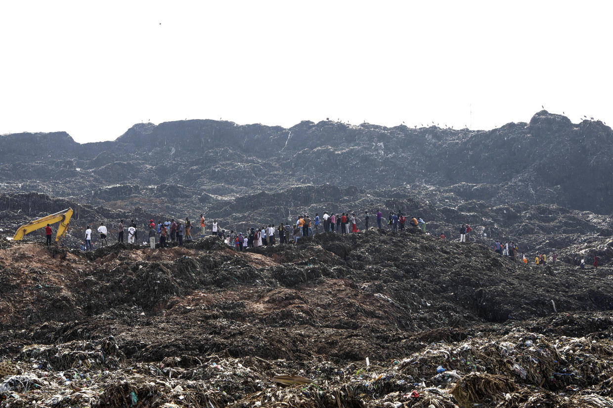 Death Toll Rises to 20 After Landfill Collapse in Uganda, Search Continues