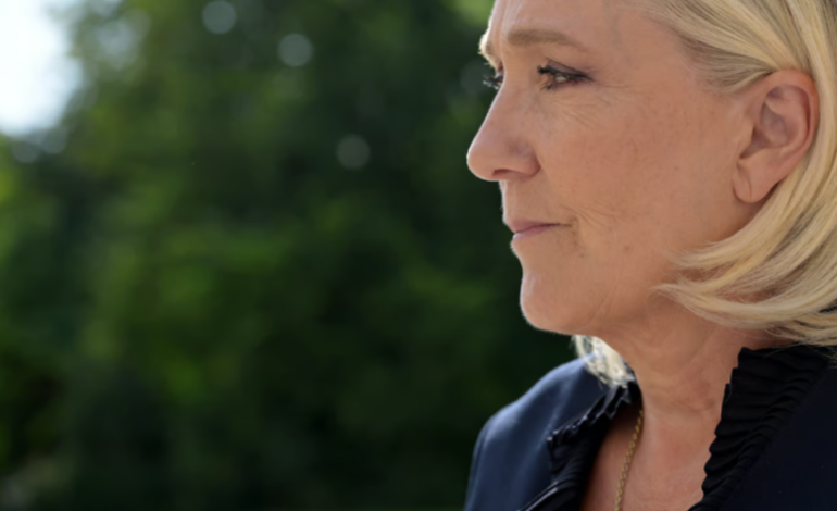 Le Pen Signals Willingness to Cooperate with New French Prime Minister Barnier