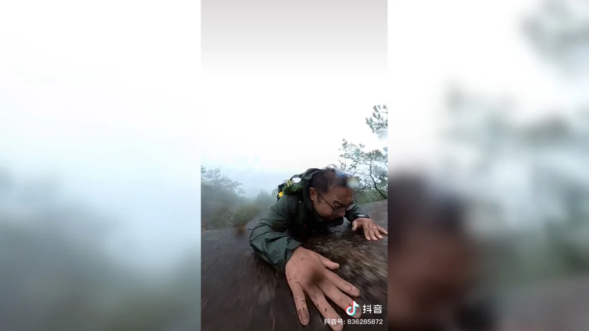 Close Call: Man Survives Steep Mountain Fall Captured on Camera in China