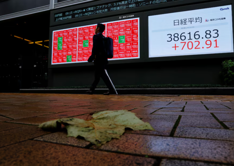 Japanese Stocks Rise as Yen Drops Following Election Shake-Up