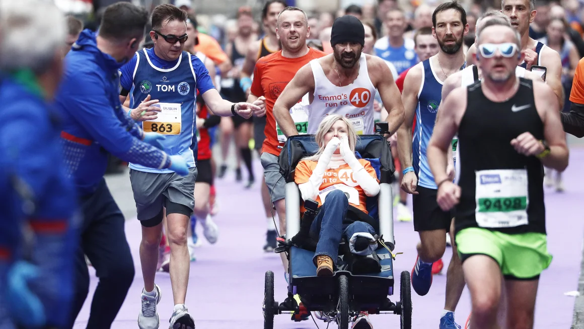 Colin Farrell Pushes Friend in Wheelchair to Finish Dublin Marathon, Raises Funds for Rare Skin Condition Charity