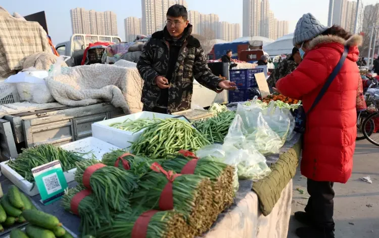 China’s Deflationary Pressures Mount in September as Inflation Cools