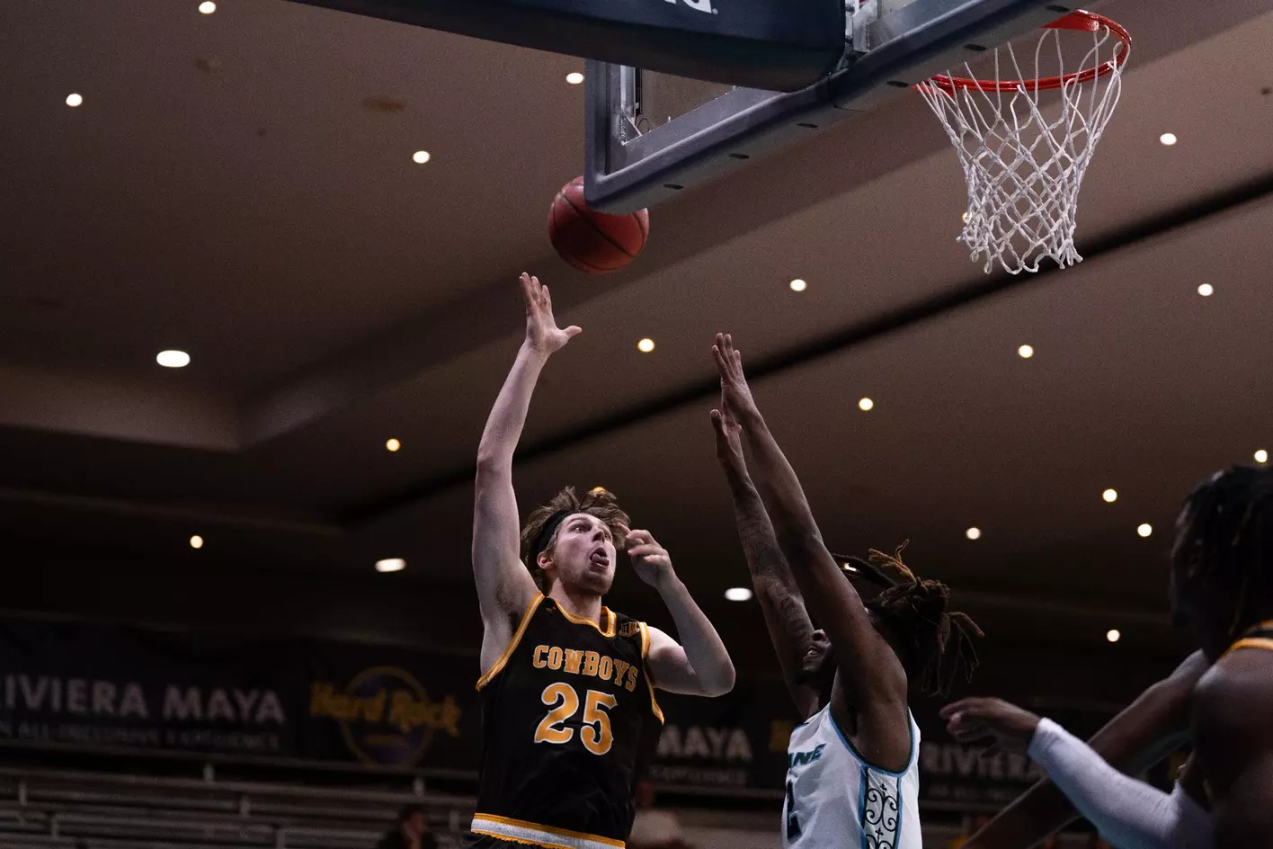 Wyoming Cowboys Secure Gritty Comeback Victory in Cancún