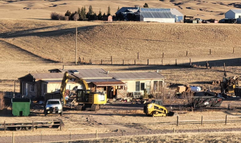 Neighbors and Sheriff Collaborate to Address Community Concerns, Leading to Demolition of Troubled Property