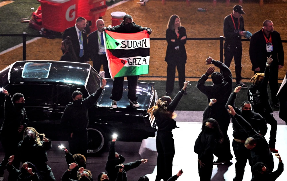 Super Bowl Halftime Performer Detained After Displaying Sudanese, Palestinian Flags