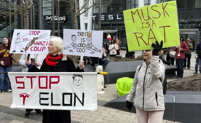 Protests at Tesla Stores Target Musk Over Government Spending Cuts
