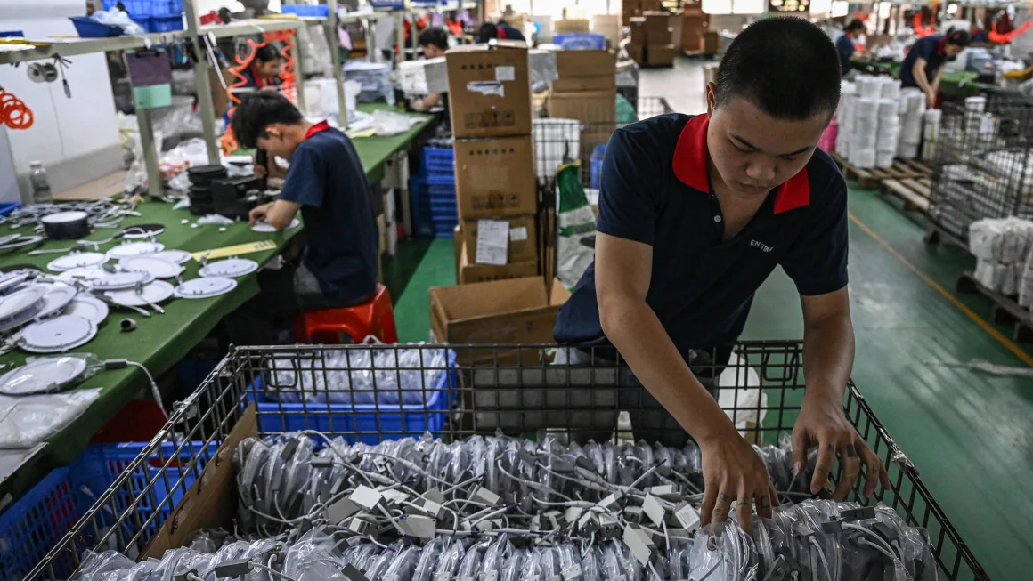 China’s Factory Output Declines at Fastest Pace in Over a Year as US Tariffs Take Hold