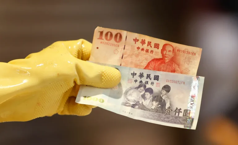 Taiwan Dollar Retreats After Record Rally Amid Currency Speculation and Trade Tensions
