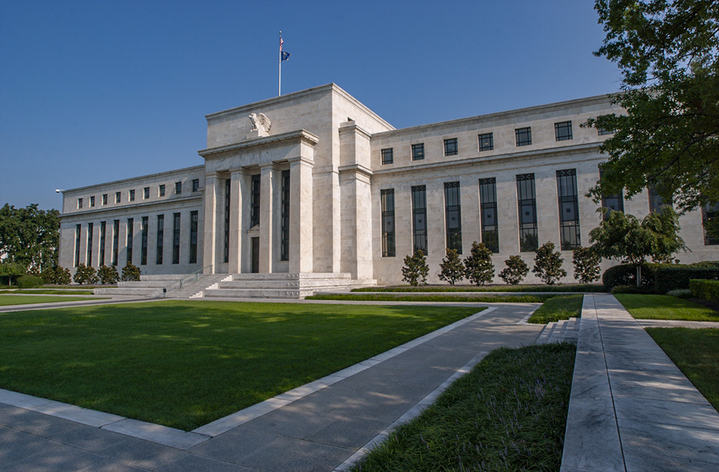 Federal Reserve Projects Slower Growth and Higher Inflation Amid Policy Shifts