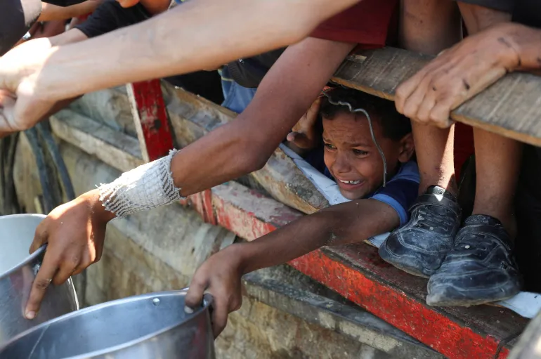 Starving for Survival: Gazans Killed While Chasing Food as Supplies — and Burial Shrouds — Run Out