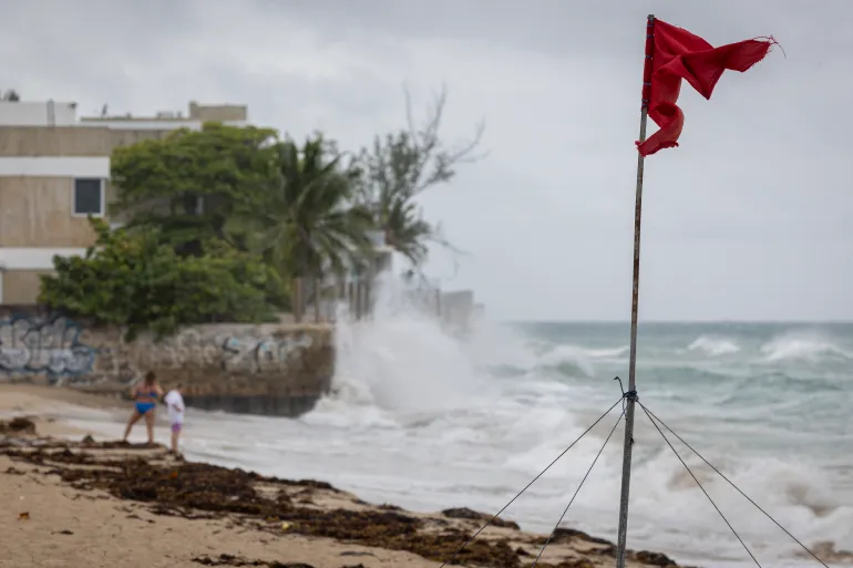 Hurricane Erin downgraded to Category 3, still packing dangerous winds