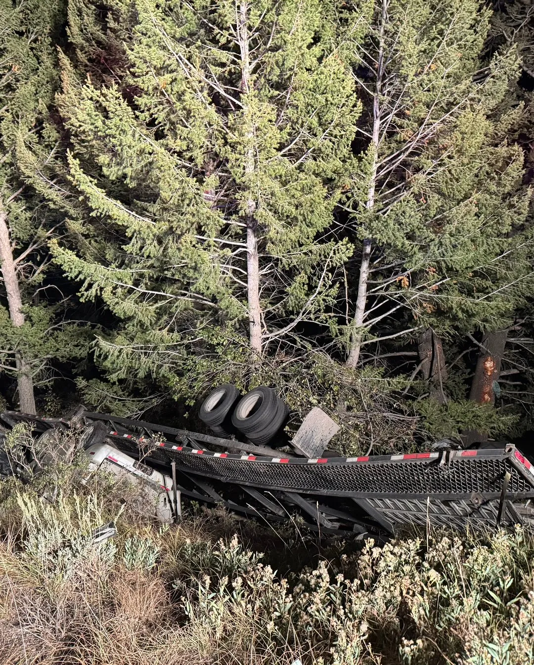 Brake failure sends car hauler through Teton Pass guardrail, sparks small fire
