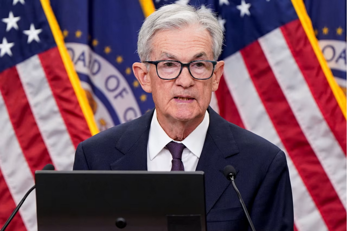 Fed cuts a quarter-point, hints at more to come as jobs cool and politics swirl