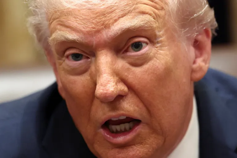 Trump says he’ll visit China ‘early next year’, signals thaw after months of trade tension