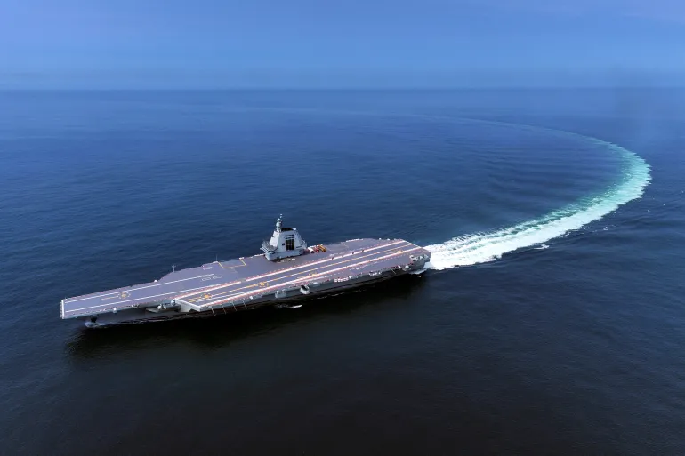 China’s new aircraft carrier enters service, signalling global naval ambitions