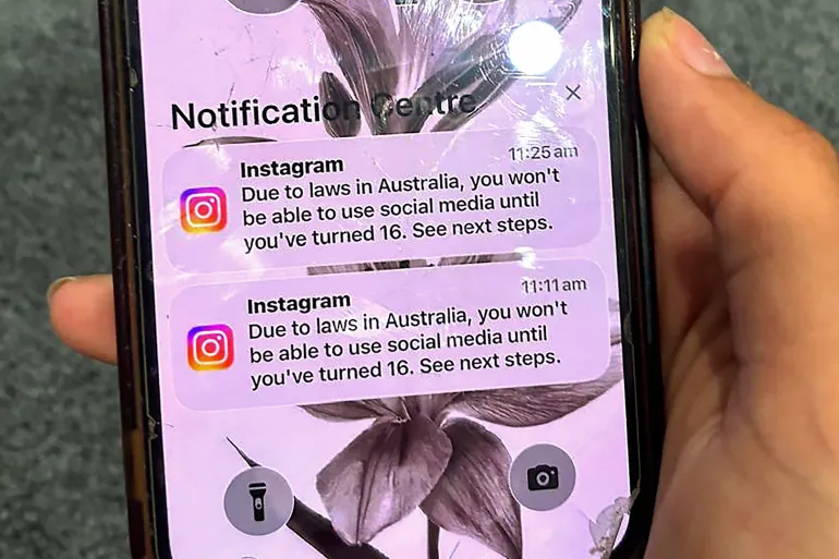 Australia becomes first country to ban under-16s from social media, sparking global watch