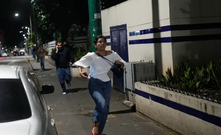 Explosions rock Caracas as Venezuela declares emergency