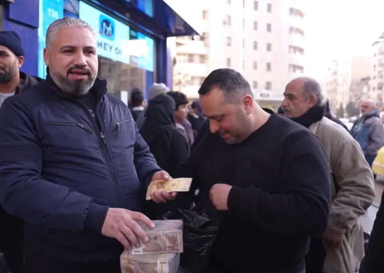 Syria swaps Assad-era banknotes for new currency as it tries to reset the economy