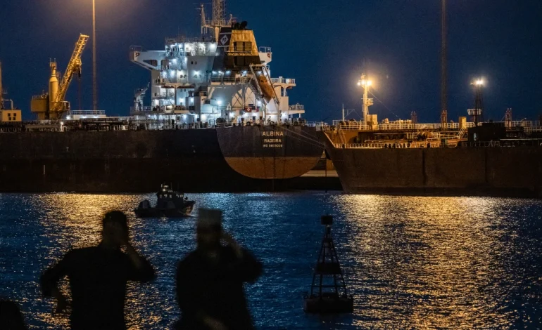 Oil Spikes, Stocks Slip as Iran War Hits One-Month Mark