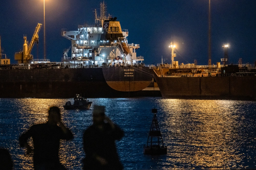 Oil Spikes, Stocks Slip as Iran War Hits One-Month Mark