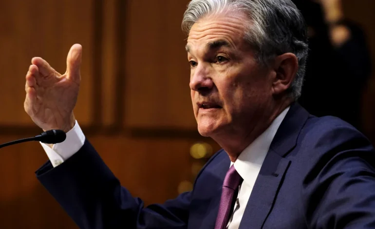 Fed Set to Hold Rates as Powell Nears Exit and War Clouds Outlook
