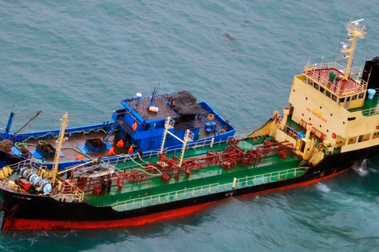 Surveillance flight spots suspected North Korea sanctions breach at sea