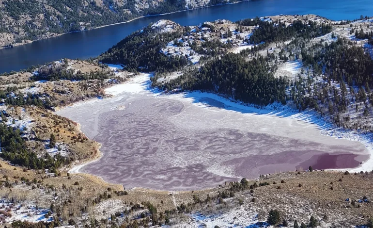Wyoming lake’s unnerving rusty-red water persists as experts offer explanations