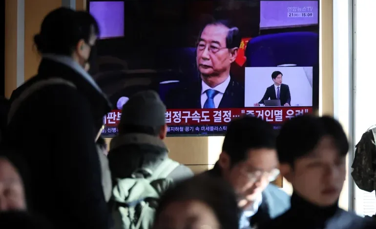 South Korea court cuts ex-PM Han Duck-soo’s sentence in martial law case
